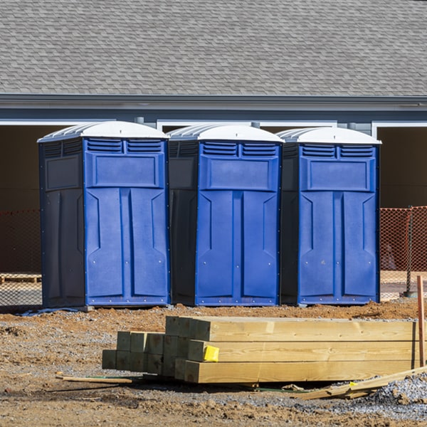 what is the cost difference between standard and deluxe portable toilet rentals in Marietta